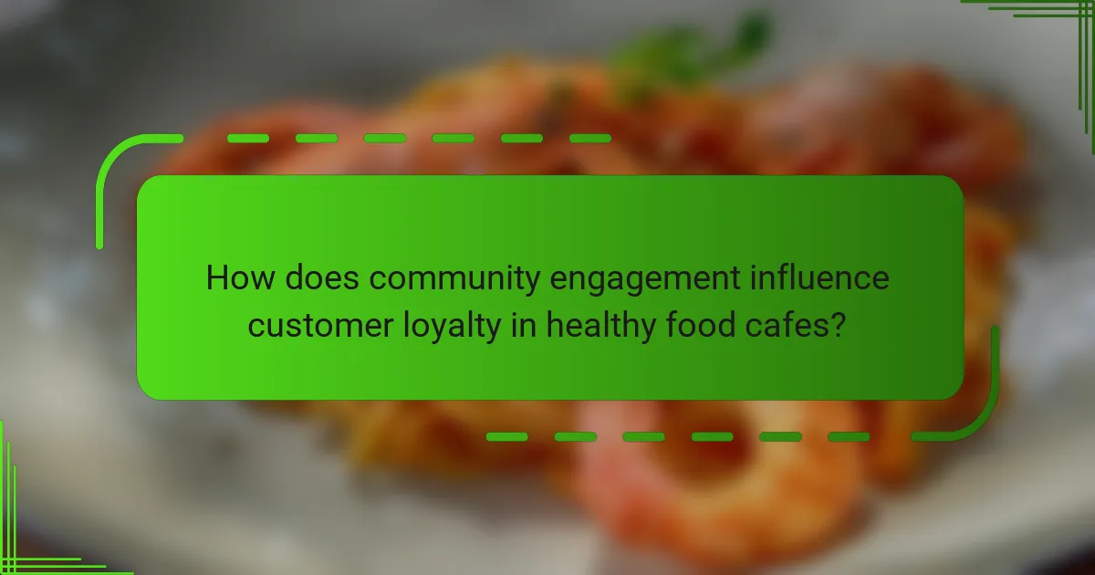 How does community engagement influence customer loyalty in healthy food cafes?